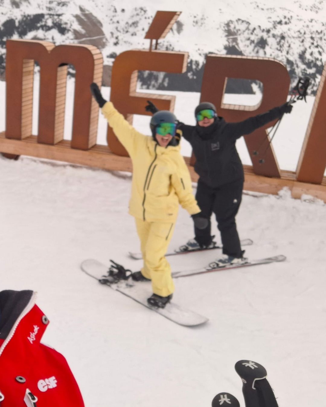 MySnow ski specialists Emily A and Emily P at the M&eacute;ribel sign