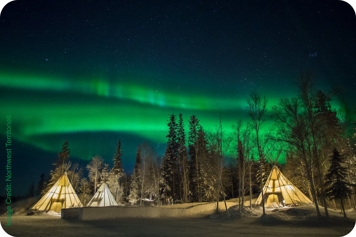 Northern Lights over teepees in Yellowknife