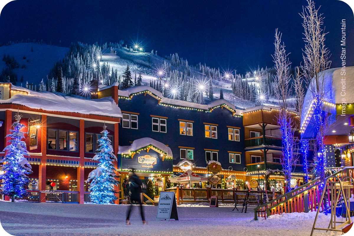 Canadian ski village lit up with Christmas lights at night